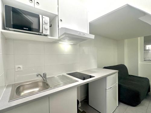 Photo de la galerie de l'établissement Cozy Apartment 2-Min Walk to Gare du Nord Fayette, à Paris