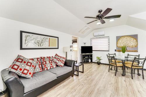 a living room with a couch and a table at Springdale Vacation Rental about 9 Mi to Fayetteville! in Springdale