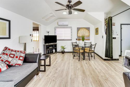 a living room with a couch and a table at Springdale Vacation Rental about 9 Mi to Fayetteville! in Springdale