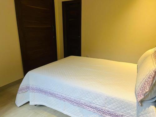 Recanto dos Ipêsにあるベッド