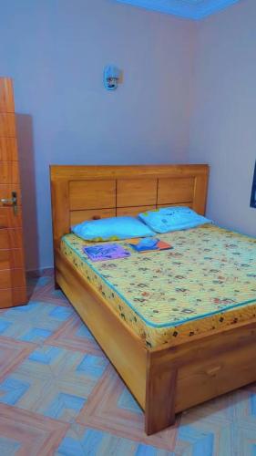 Giường trong phòng chung tại Residence des Nobles