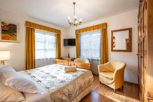 Ένα ή περισσότερα κρεβάτια σε δωμάτιο στο OLIMPIA LODGE
