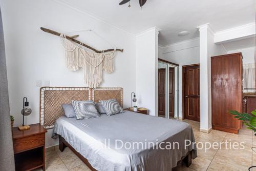 a bedroom with a bed in a room at Ocean Dream Studios, kiters paradise! in Cabarete