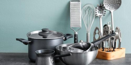 a kitchen counter with cooking utensils on a counter top at AMAL HoME in Ouagadougou