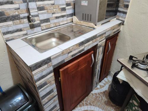 Kuchyň nebo kuchyňský kout v ubytování NDK Home Meublés