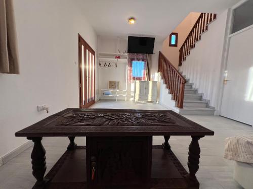 a room with a table in the middle of a room at First Eco-Villa in Polis Chrysochous
