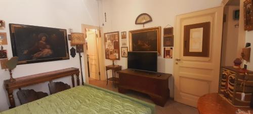 TV a/nebo společenská místnost v ubytování B&B Fuori Dai Coppi - Bologna