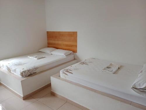 Postel nebo postele na pokoji v ubytování Finca Caña Miel