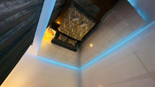 an overhead view of a room with blue lights at Hedonist Spa Jacuzzi Sarajevo Free parking in Sarajevo