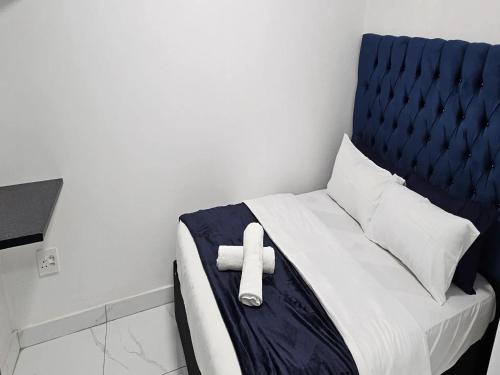 Кровать или кровати в номере Goshen Lodge Spencer