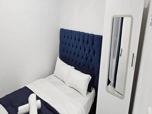 Кровать или кровати в номере Goshen Lodge Spencer