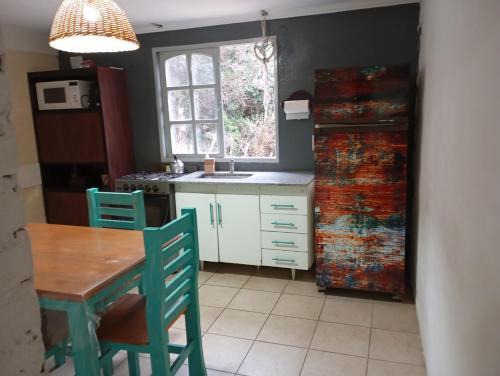 Kuchyň nebo kuchyňský kout v ubytování Vistacalma