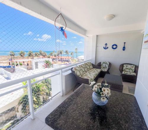 Balkón nebo terasa v ubytování Cobertura duplex à beira-mar com jacuzzi e cascata