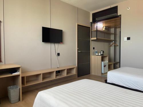 Postel nebo postele na pokoji v ubytování Penview Hotel
