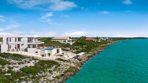 an aerial view of a house on an island in the water at Villa Julia and Villa Angelina in Leeward