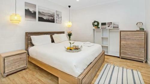 Postel nebo postele na pokoji v ubytování Fern Creek Cottage Berrima