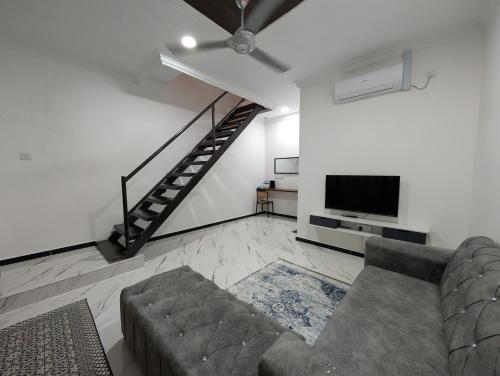 Una televisión o centro de entretenimiento en Flouzan Villa