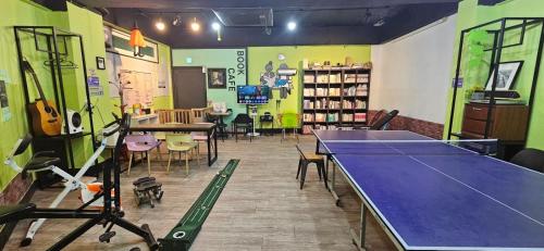 a room with a ping pong table in a store at Economy Hotel Incheon Bupyeong Branch in Incheon
