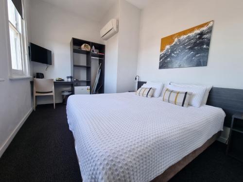 Postel nebo postele na pokoji v ubytování Doctor Syntax Hotel