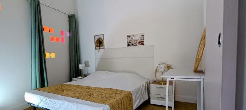 Postel nebo postele na pokoji v ubytování LA PALMERAIE - Locations de Villas et Appartements