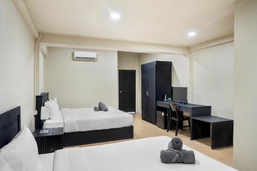 Katil atau katil-katil dalam bilik di Simply Stay Chaweng