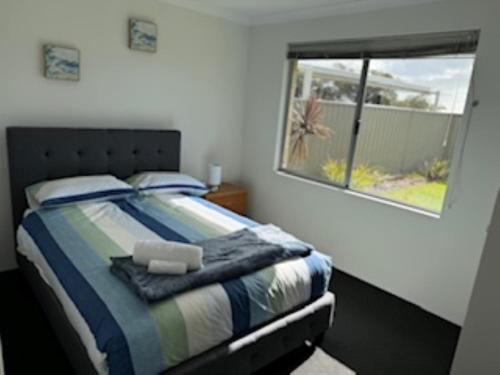 Postel nebo postele na pokoji v ubytování Luxury 4 bedroom house in Wellard only 30 minutes from Perth City