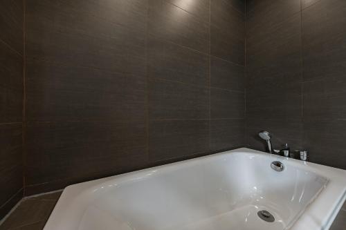 Un baño de T innn - West Lake - Yueshang Yunshe Homestay - Hangzhou Taiziwan Park Branch