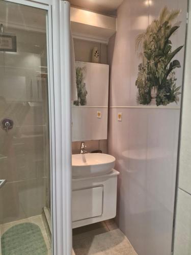 a bathroom with a toilet and a sink and a shower at Breakers Resort, Umhlanga, 232 in Durban