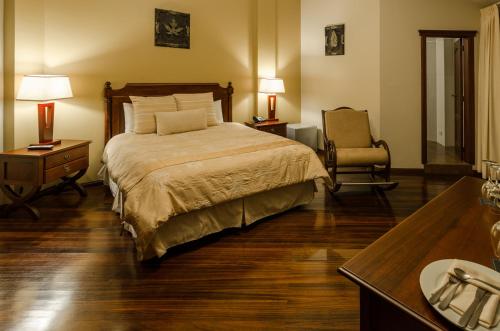 Ένα ή περισσότερα κρεβάτια σε δωμάτιο στο Hotel Spa Casa Real