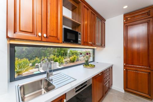 Η κουζίνα ή μικρή κουζίνα στο Apartment GiN