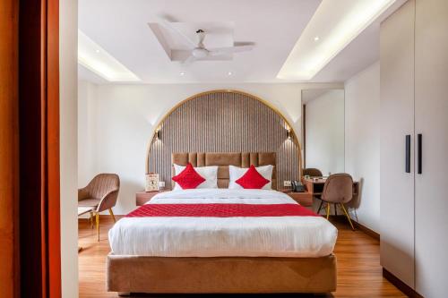 Postel nebo postele na pokoji v ubytování Hotel AVAAS - Faiz Road Karol Bagh
