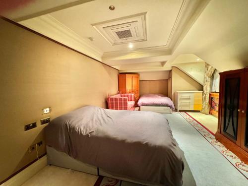 a bedroom with a bed in a room at The Bishop in London