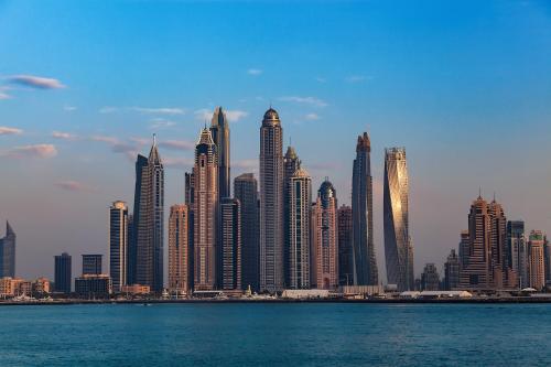 a view of a large city with skyscrapers at SKY HIGH 2 BHK # Ain Dubai & Sea View # Marina & JBR in Dubai