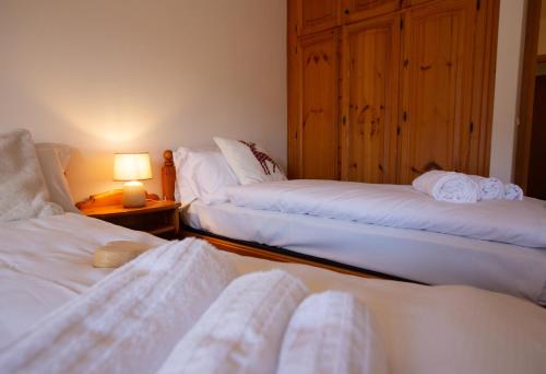 Letto o letti in una camera di Bike & Bikers Hotel Restaurant