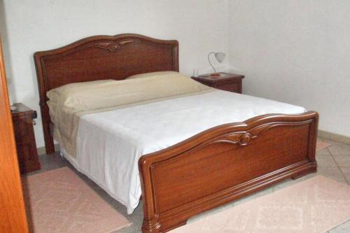 Katil atau katil-katil dalam bilik di Charming apartment in Nughedu Santa Vittoria - 90 m² with fireplace