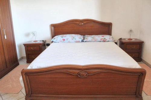 Katil atau katil-katil dalam bilik di Charming apartment in Nughedu Santa Vittoria - 90 m² with fireplace