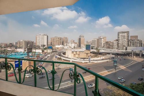 a view of a city from a balcony at Holidays Express Hotel in Cairo
