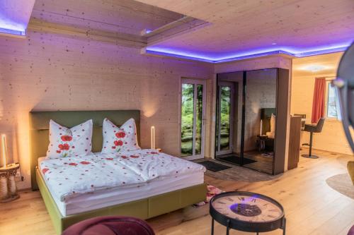 Ένα ή περισσότερα κρεβάτια σε δωμάτιο στο Ferienhaus LEBENSFREUDE