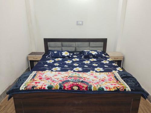 En eller flere senge i et værelse på Welcome to AG HOME STAY