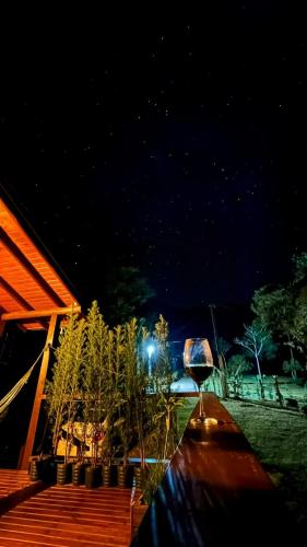 Taman di luar Cabana com visual incrível para a Serra
