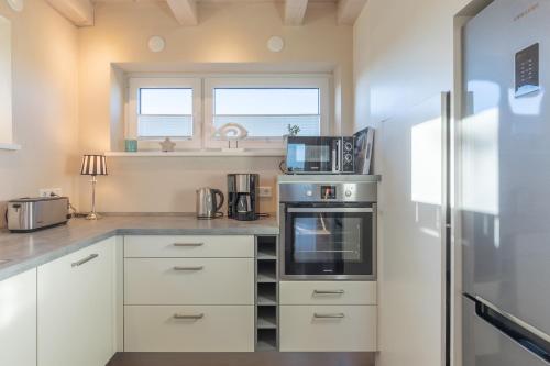 Dapur atau dapur kecil di Deichhaus Lotte