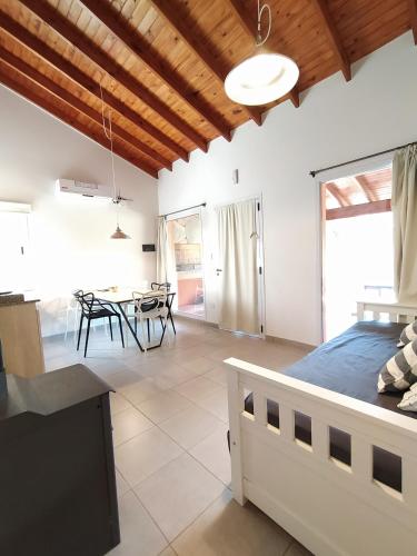 Una cama o camas en una habitación de Complejo Verde Memoria