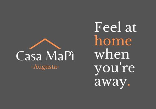 a sign that reads feel at home when youre away at Casa Ma Pì - relax e comfort nel centro di Augusta in Augusta