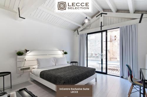 Postel nebo postele na pokoji v ubytování InCentro Comfort Suite - Lecce Selection