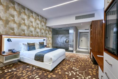 Un pat sau paturi într-o cameră la Hotel 430