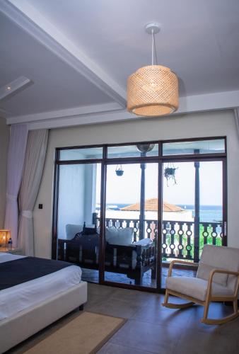 Ένα ή περισσότερα κρεβάτια σε δωμάτιο στο The Hayce residence beach Maisionette
