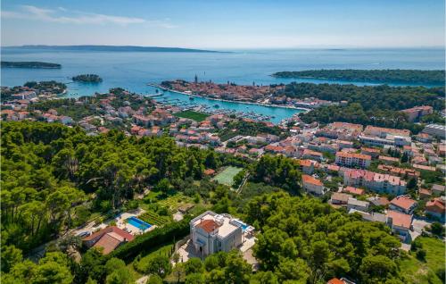 an aerial view of a city and a body of water at 6 Bedroom Lovely Home In Rab in Rab