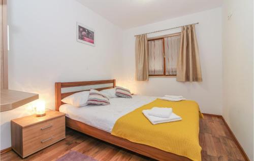 Ένα ή περισσότερα κρεβάτια σε δωμάτιο στο 2 Bedroom Lovely Apartment In Gracisce
