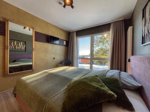Кровать или кровати в номере Berghotel Hohegeiß