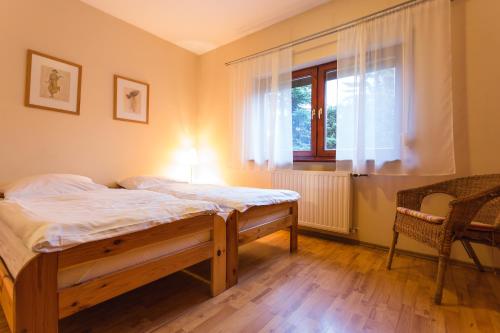 En eller flere senge i et værelse på Aparthouse